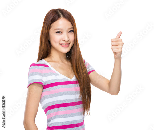 Young woman with thumb up