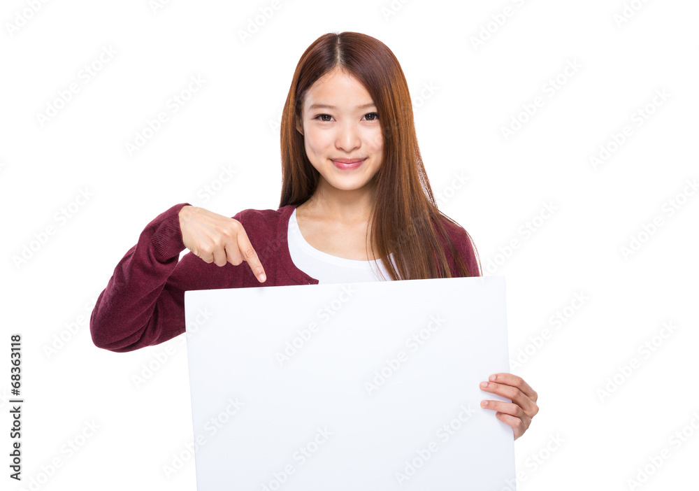 Woman finger point down to placard Woman finger point down to placard