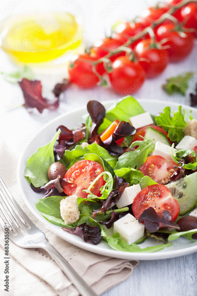 healthy salad with tomatoes olives and feta cheese