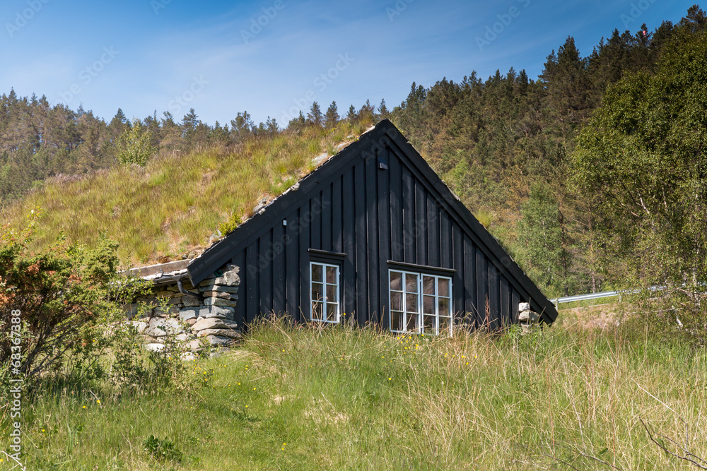 Obraz premium Wooden hut in famous Revsvatnet park, Norway