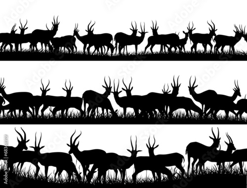 Horizontal banner silhouettes of herd of antelope in African sav
