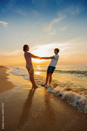 Boy and girl on the beach