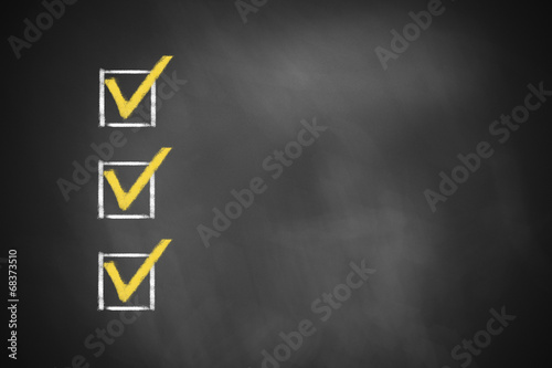 three checkboxes on chalkboard