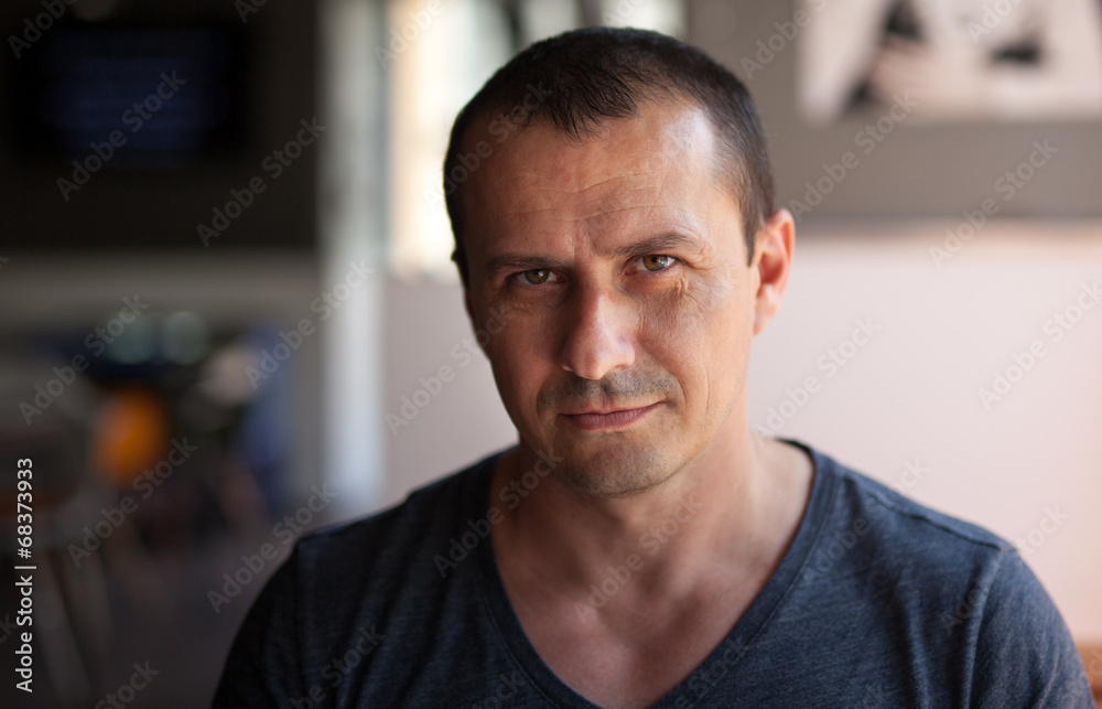 Indoor closeup portrait of a man Indoor closeup portrait of a man