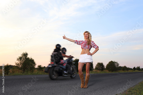 girl takes a hitcher