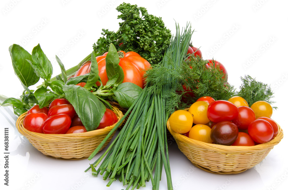 Composition of different varieties of tomatoes with herbs Composition of different varieties of tomatoes with herbs