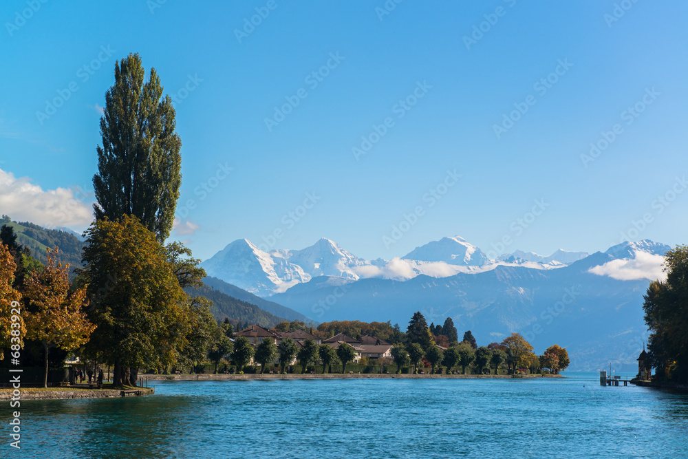Alps and Thun lake near Spiez town in Switzerland