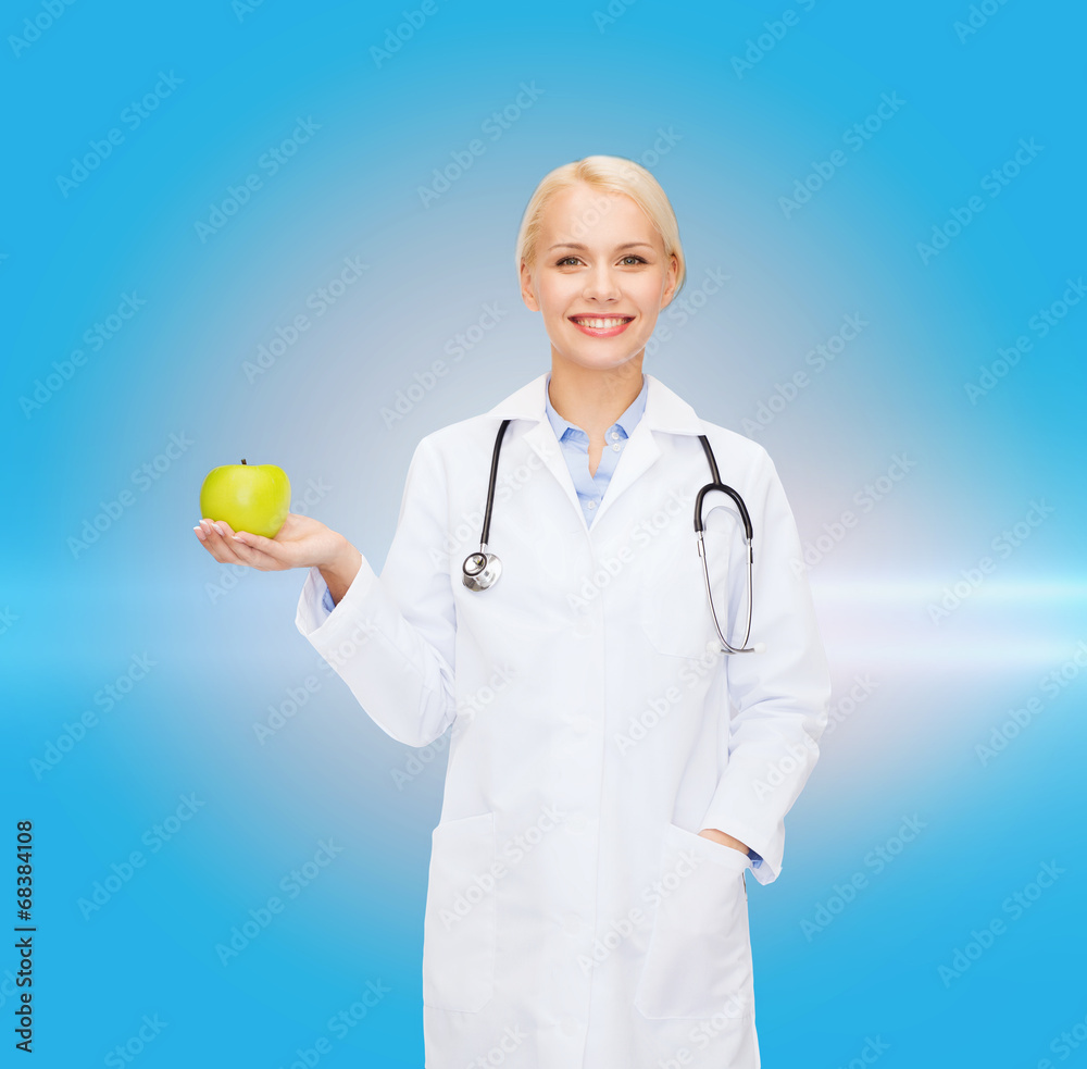 smiling female doctor with green apple smiling female doctor with green apple