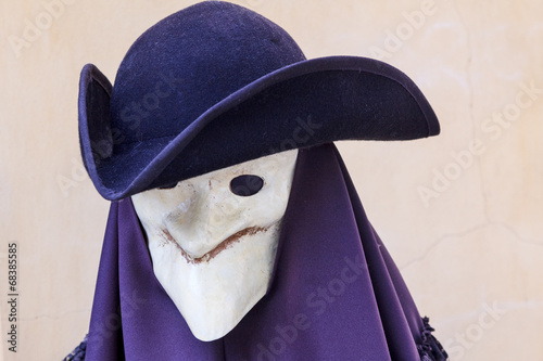фотографія Worn undecorated carneval mask like Giacomo Casanova