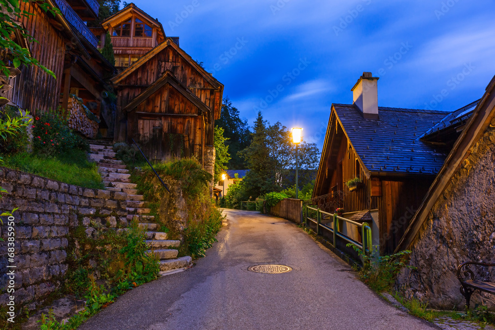 Streets of Hallstatt village in Alps at night, Austria