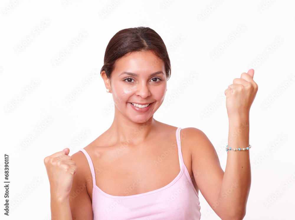 Lovely hispanic girl with victory gesture Lovely hispanic girl with victory gesture