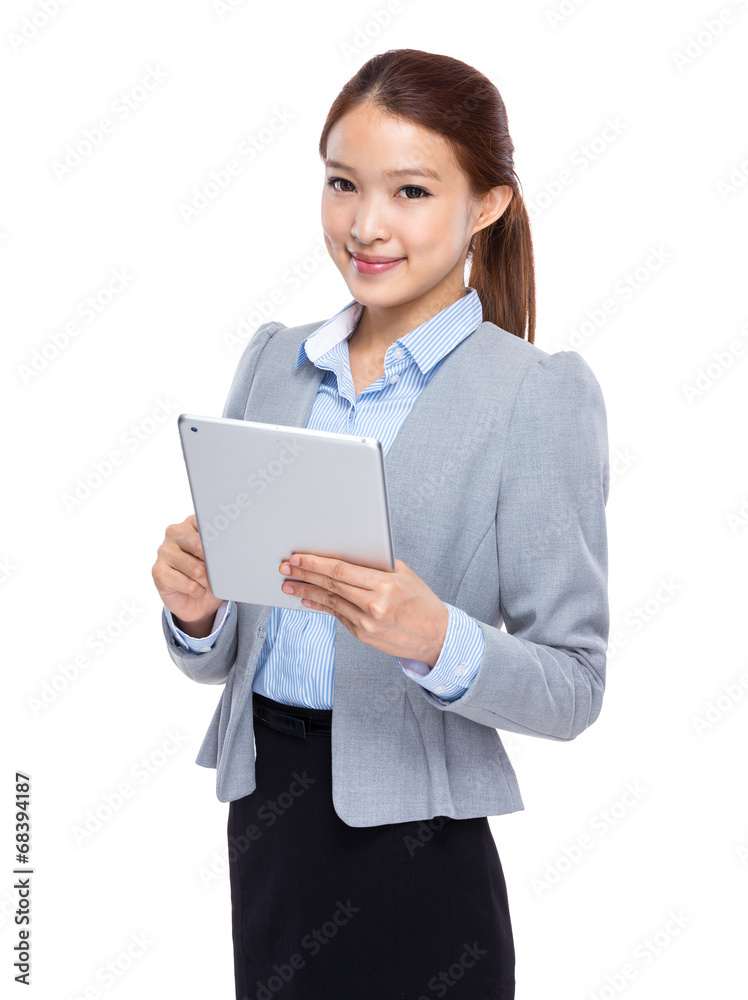 Businesswoman touch on digital tablet Businesswoman touch on digital tablet