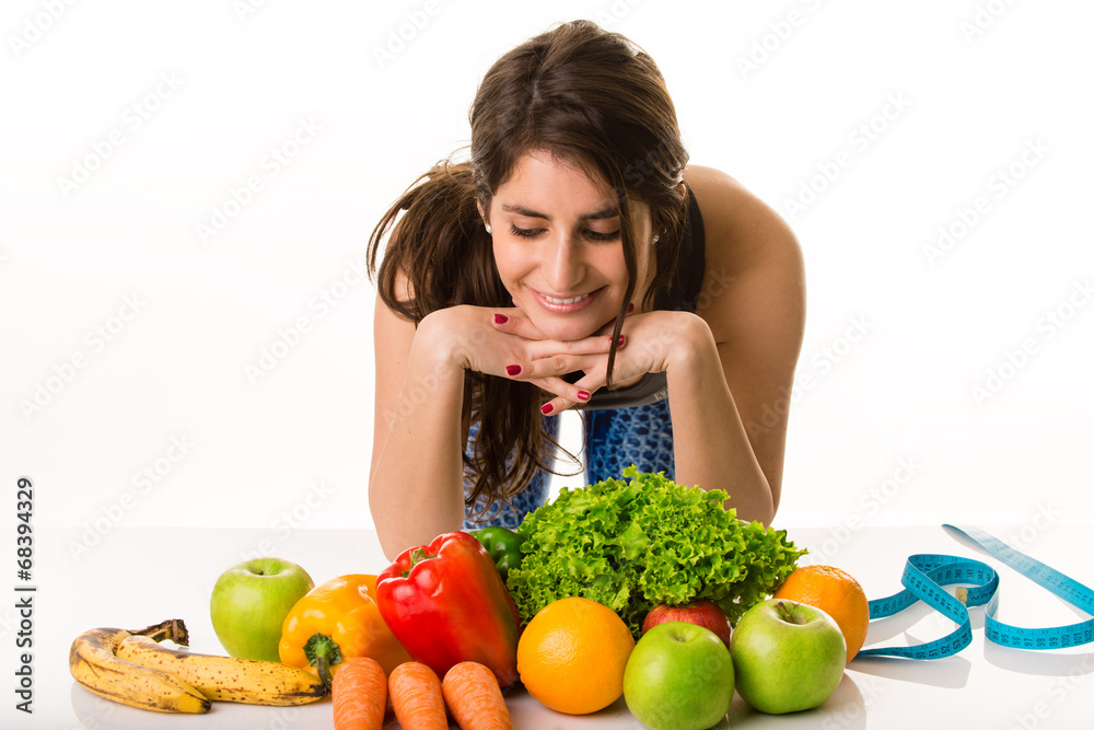 Sporty girl enjoying her fresh vegetables Sporty girl enjoying her fresh vegetables