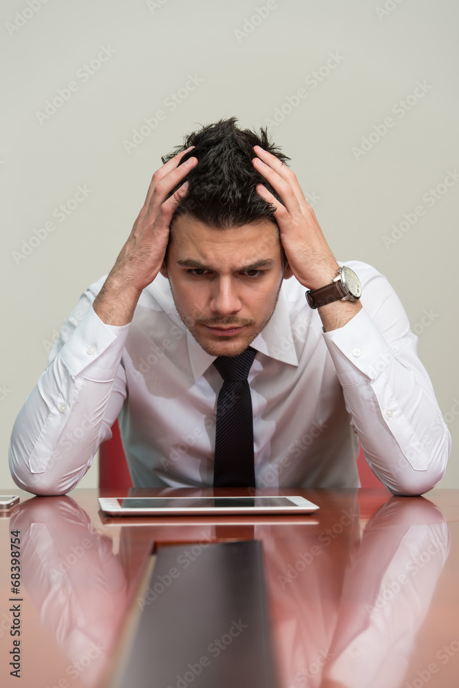 Young Businessman Stressful In The Office Young Businessman Stressful In The Office