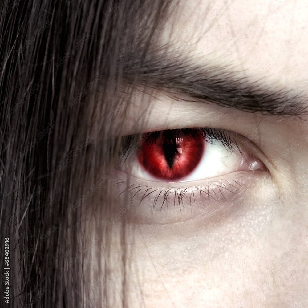 Fototapeta premium face of a young male vampire close up