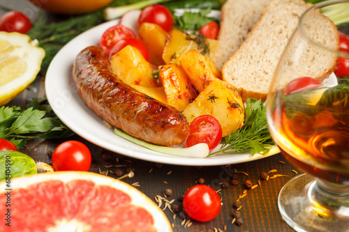 sausage with potatoes and vegetables