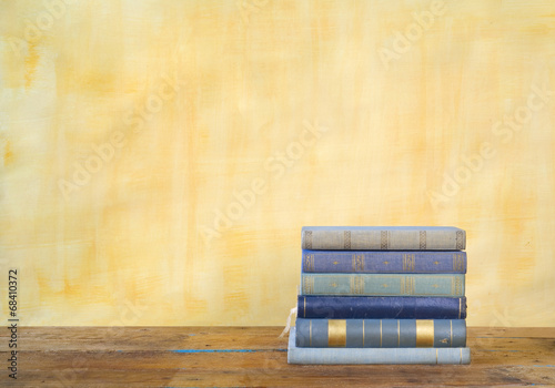 stack of books. grungy background, free copy space