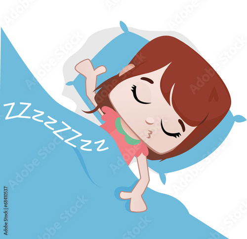 A little girl sleeping in her bed