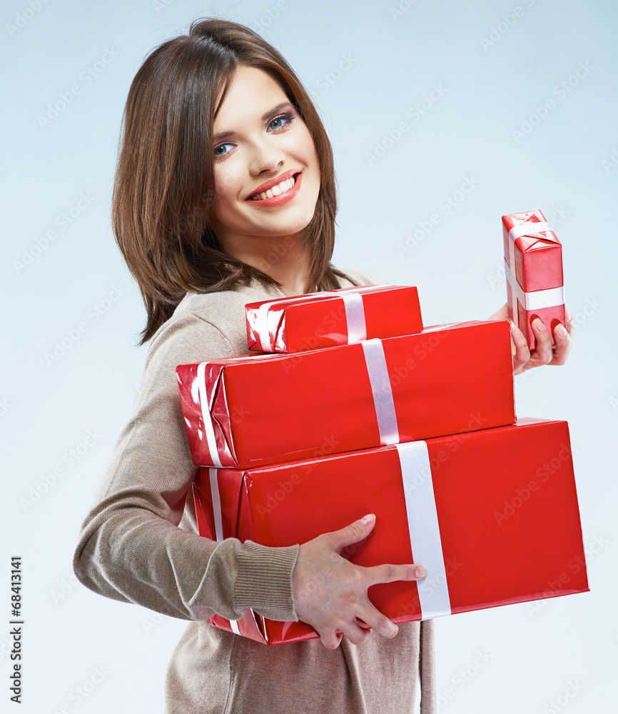 Smiling happy woman hold red gift box. Smiling happy woman hold red gift box.