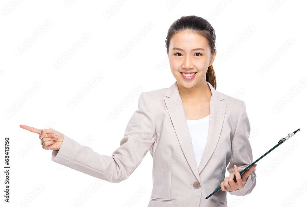 Asian businesswoman with clipboard and finger point out Asian businesswoman with clipboard and finger point out