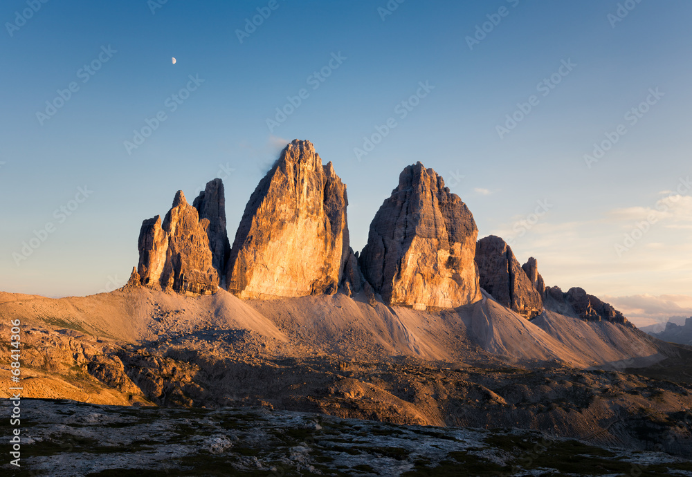 Panorama of Tre Cime at sunny sunset