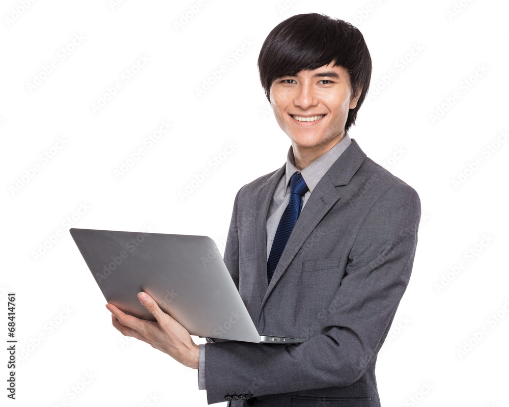 Young businessman use notebook computer Young businessman use notebook computer