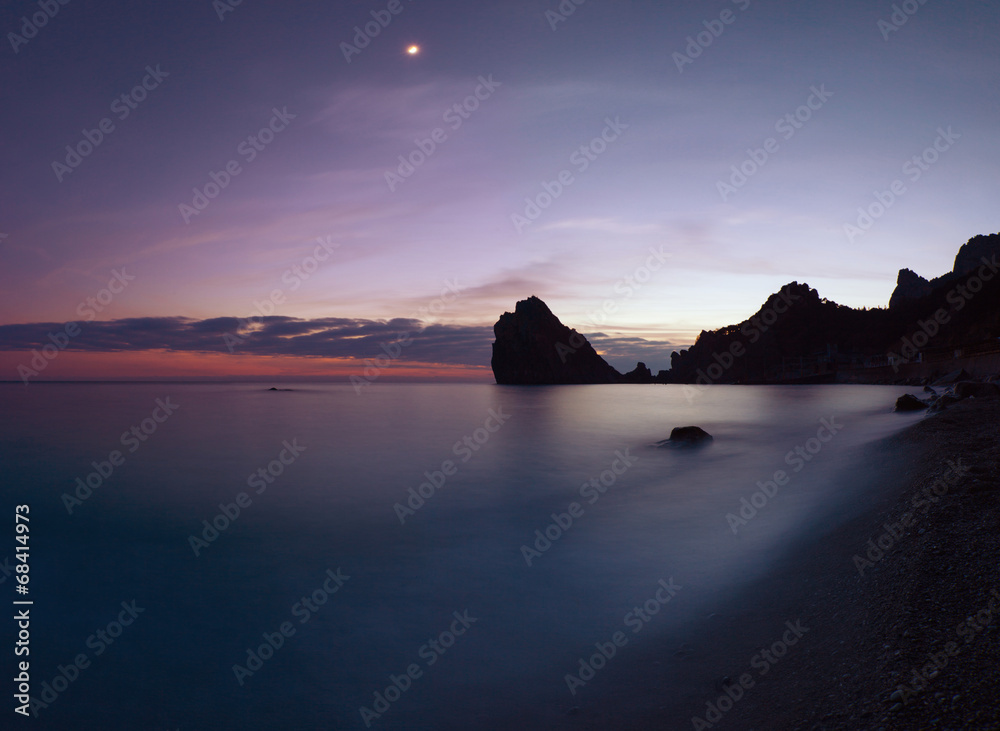 Rocky coastline after sunset
