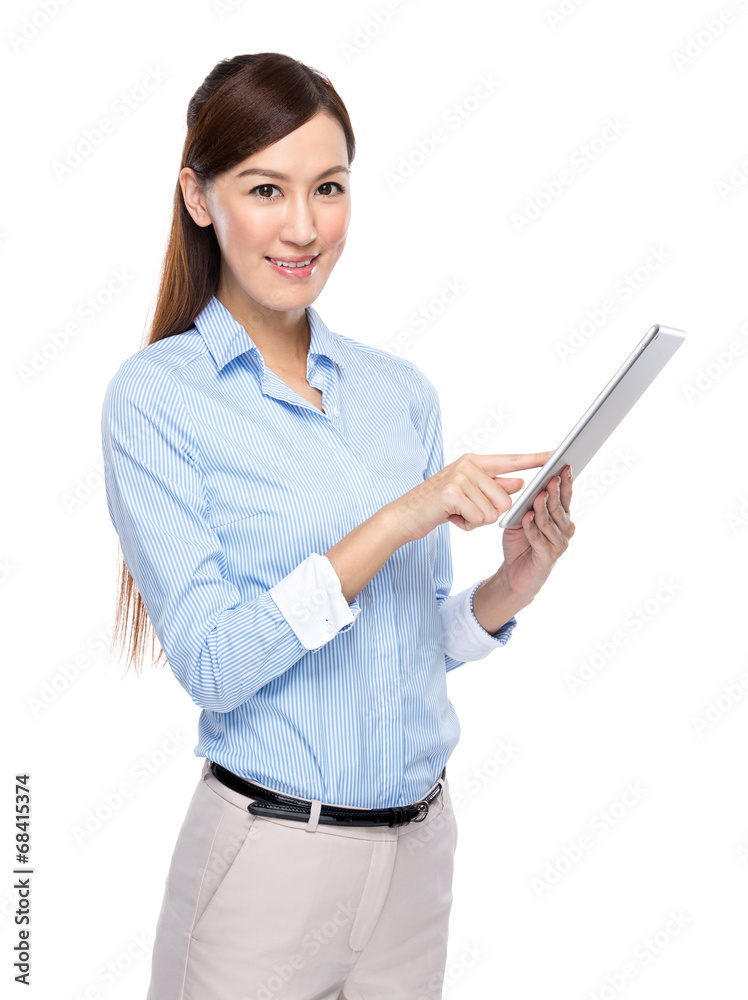 Businesswoman touch on digital tablet Businesswoman touch on digital tablet