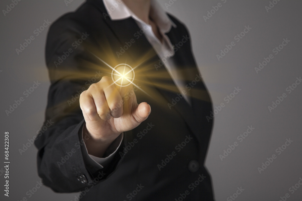 Fototapeta premium Businesswoman touch screen