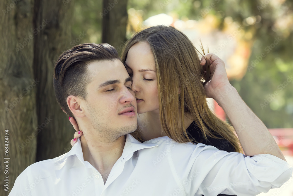 Obraz premium portrait of a loving couple on nature in park