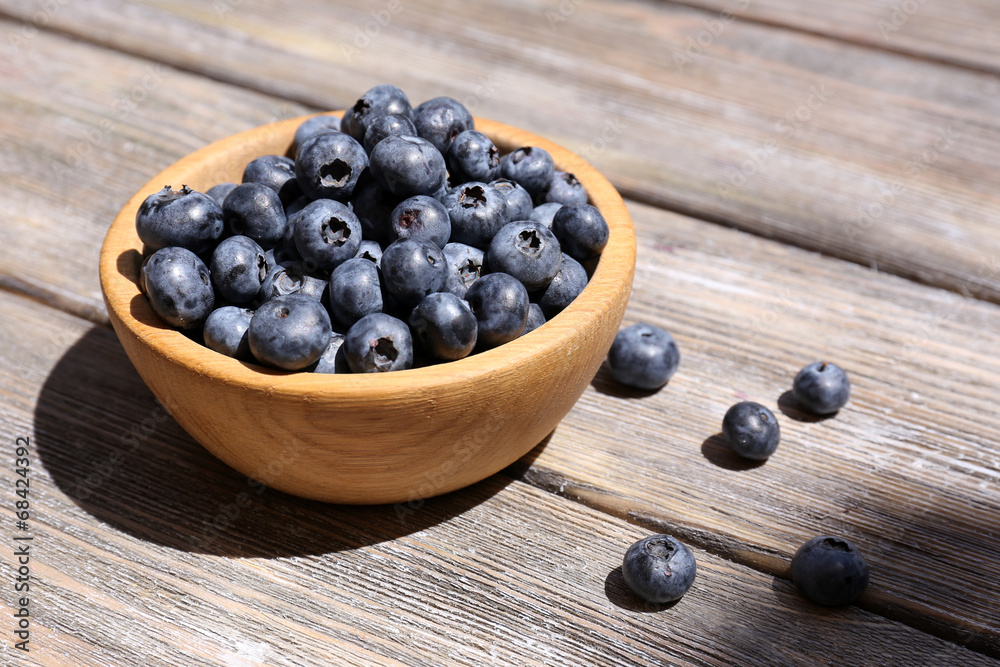 Fresh blueberries on wooden table Fresh blueberries on wooden table