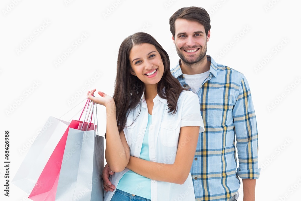 Attractive young couple with shopping bags Attractive young couple with shopping bags