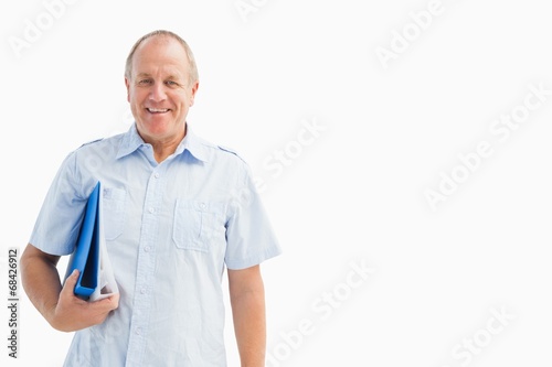 Happy mature student holding folder