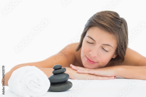 Close up of a beautiful young woman on massage table