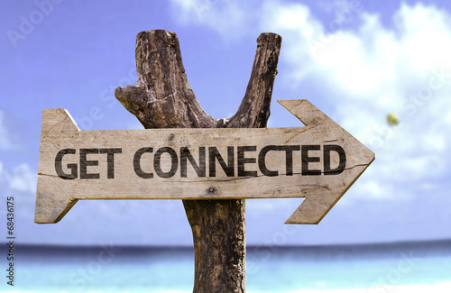 Get Connected wooden sign with a beach on background