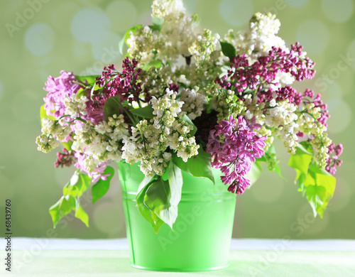 Beautiful lilac flowers in vase 
