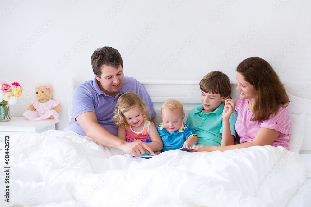 Happy big family in a bed Happy big family in a bed