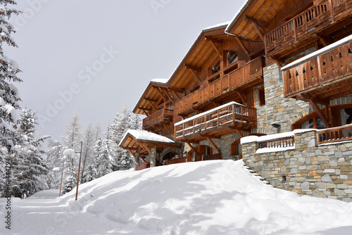 Ski resort hotel in the snow photo