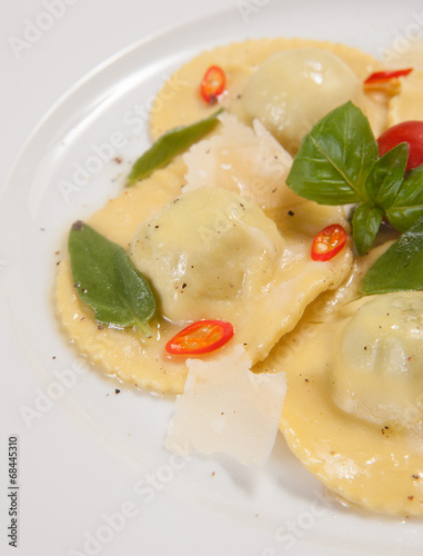 Ravioli with red chily pepper and sweet basil