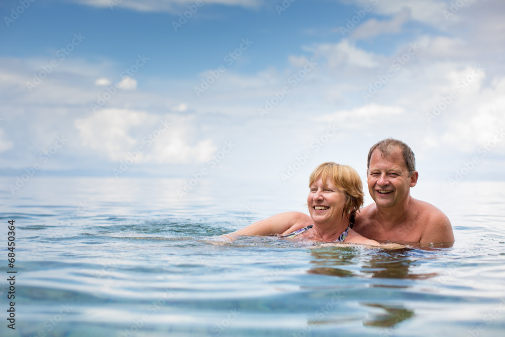 Senior couple enjoying the retirement on a seacost Senior couple enjoying the retirement on a seacost