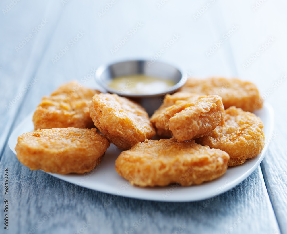 chicken nuggets with honey mustard in natural light chicken nuggets with honey mustard in natural light