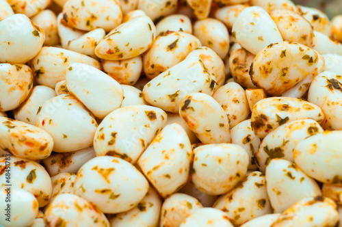 Close up shot of seasoned Pickled Garlic