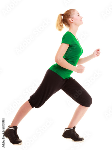 Sport. Flexible fitness girl doing stretching exercise