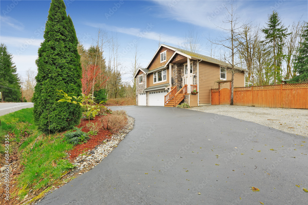 House exterior with stone wall trim House exterior with stone wall trim