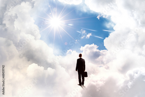 Businessman in heaven © Sergey Nivens