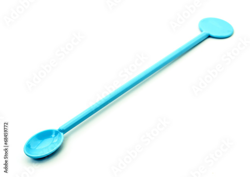 Blue spoon on a white background
