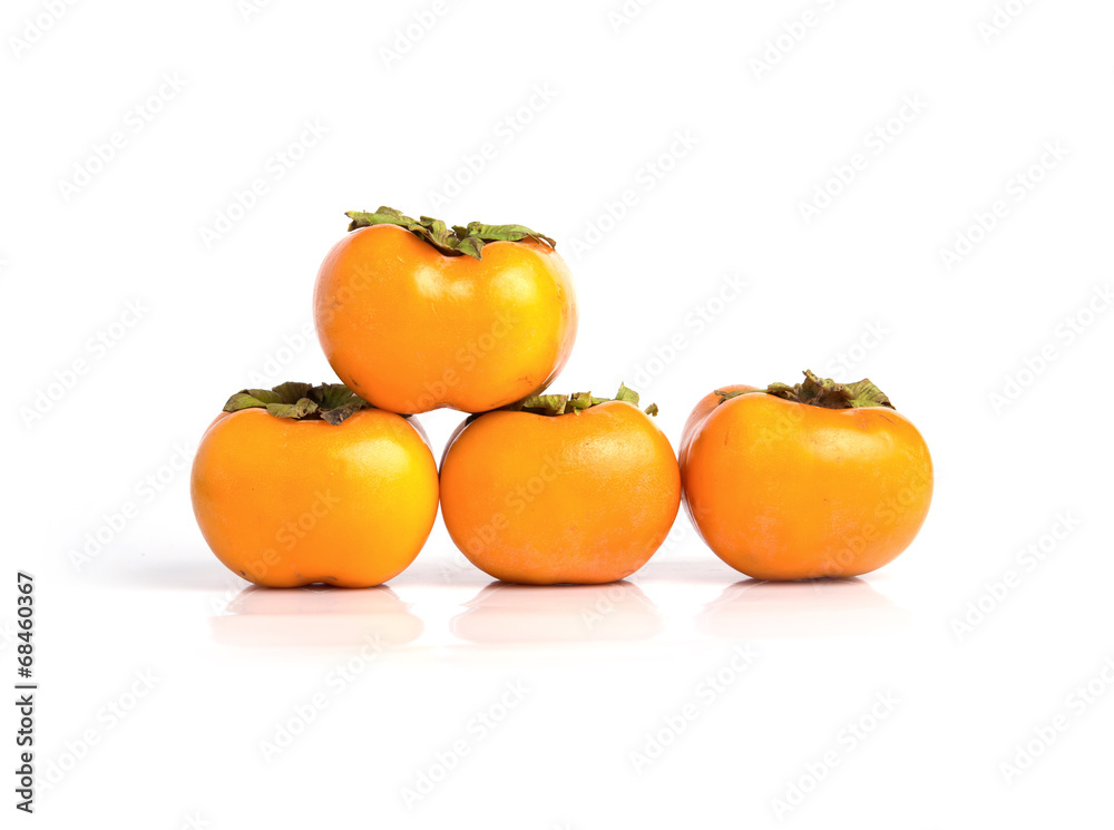 Ripe persimmon isolated on a white background Ripe persimmon isolated on a white background
