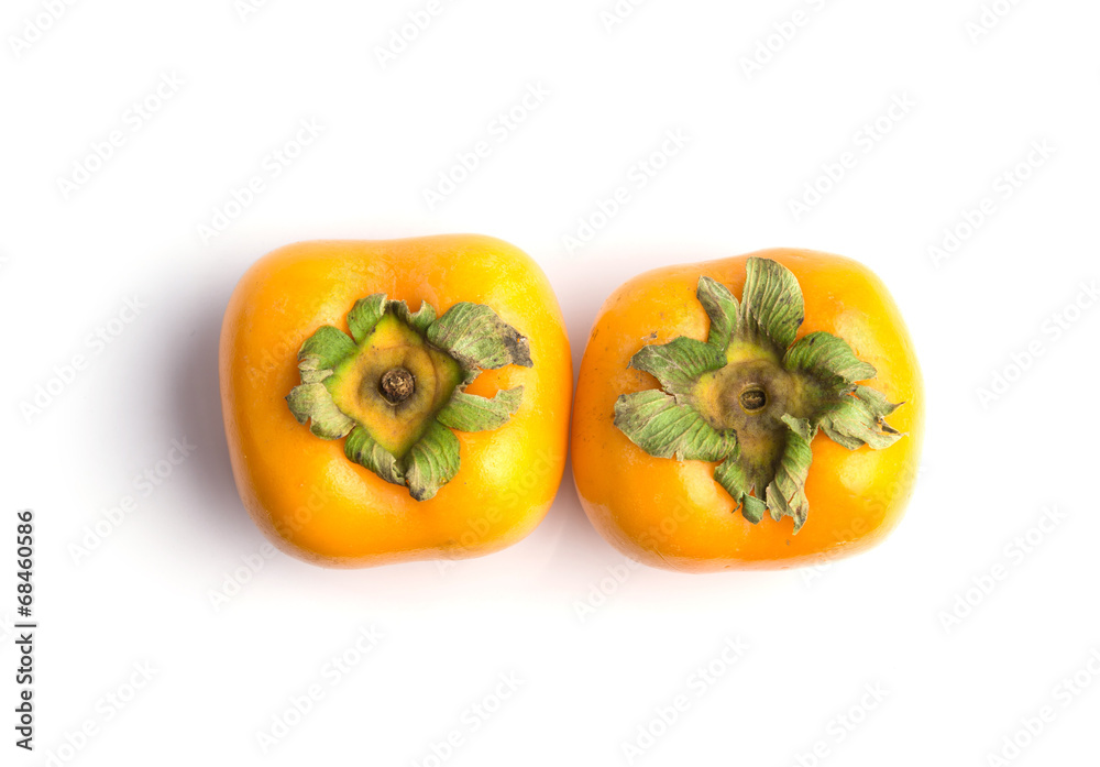 Ripe persimmon isolated on a white background