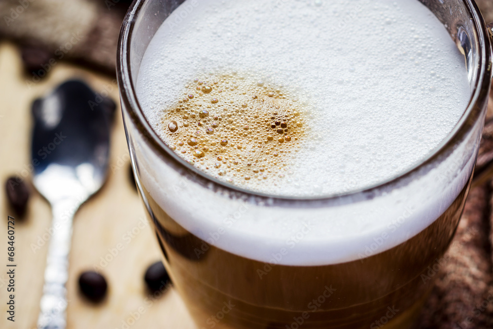 glass of cappuccino coffee on wooden glass of cappuccino coffee on wooden