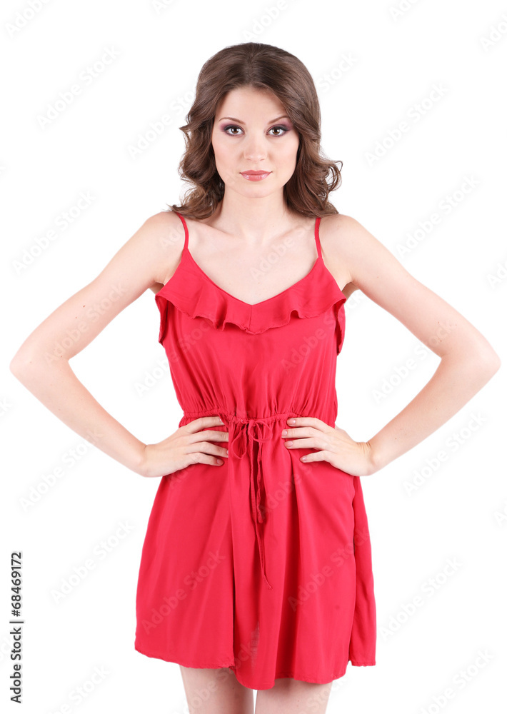 Beautiful young girl in red dress isolated on white